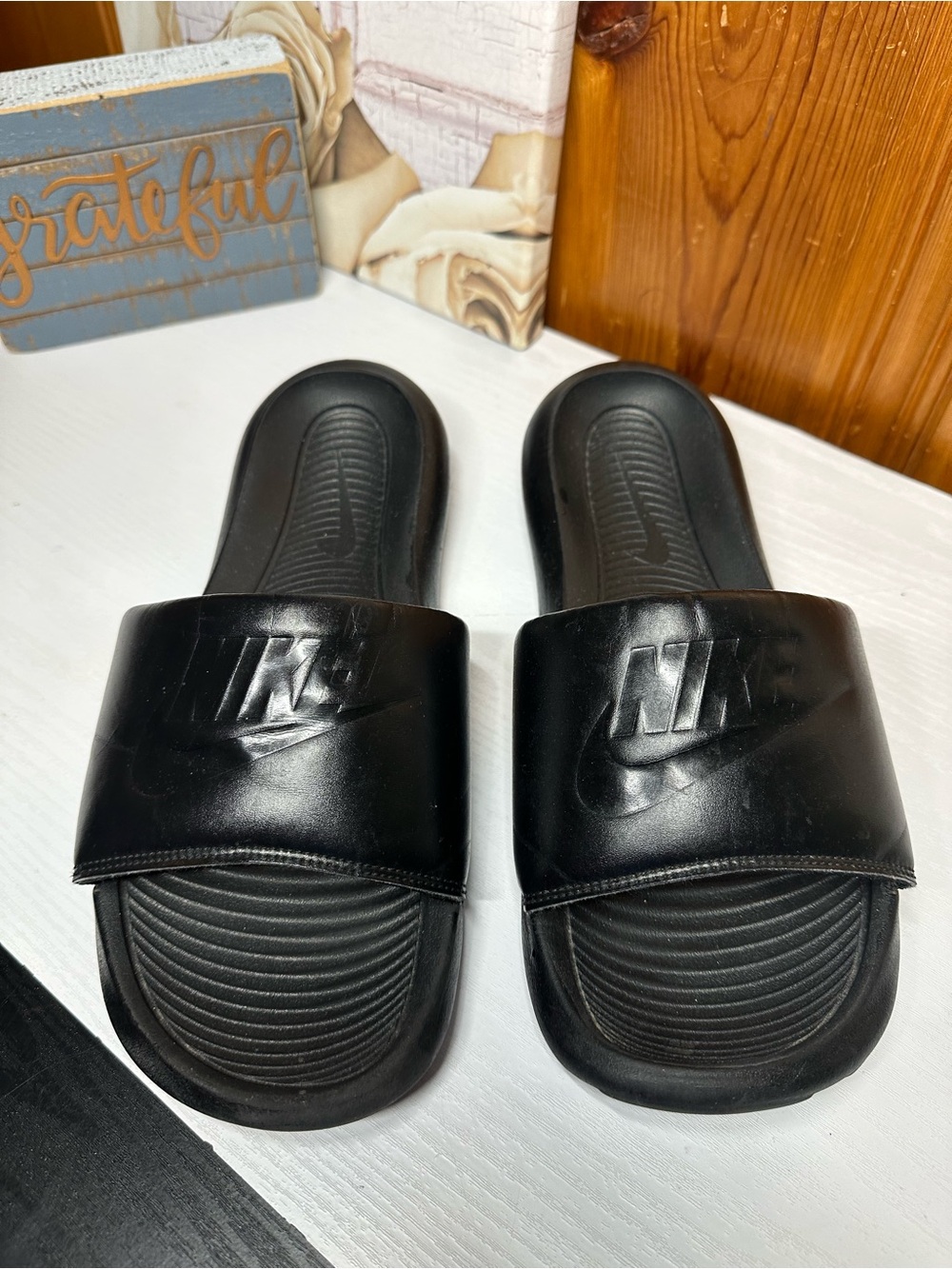 Nike Black Slide Sandals with Embossed Logo